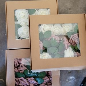 2.5 boxes of white and dusty rose lings moments flowers
